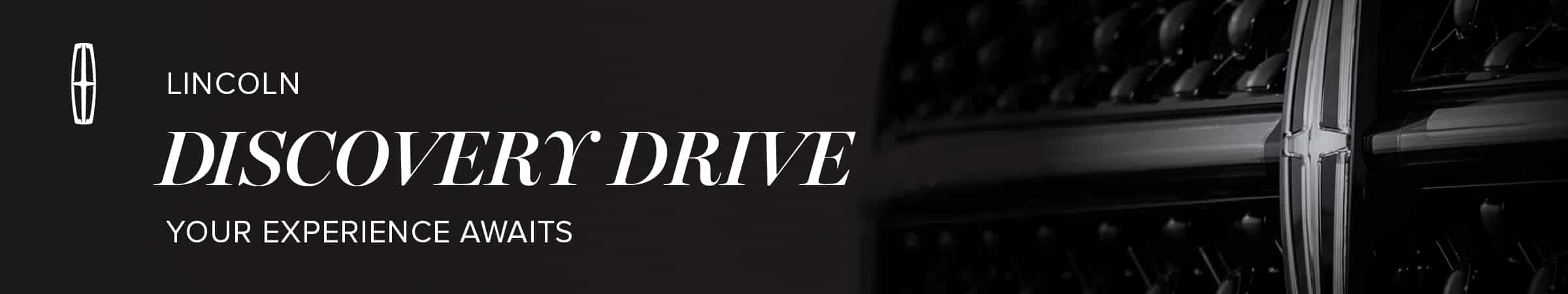 Lincoln Discovery Drive banner with logo and grille detail, inviting an exclusive experience.
