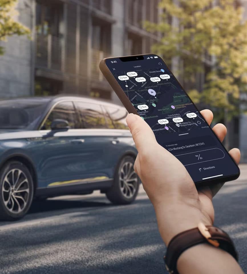 Smartphone displaying a navigation app near a parked blue SUV on a city street.